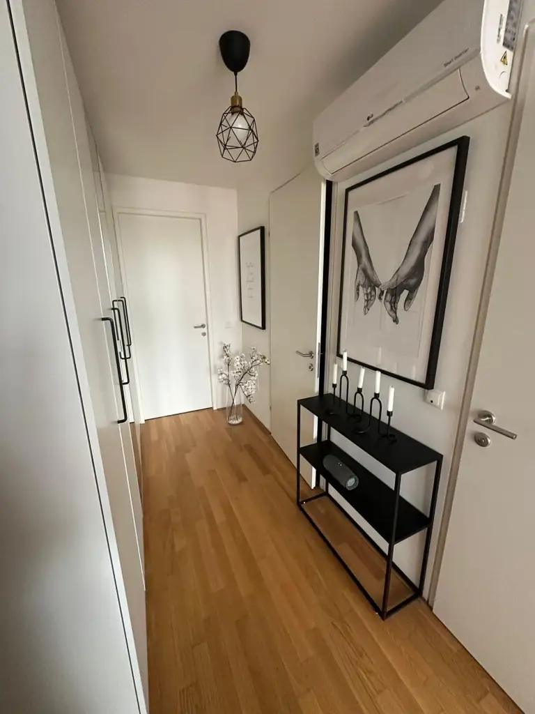 Klimatisierte Neubauwohnung mit hofseitigem Balkon im Dachgeschoss!!!