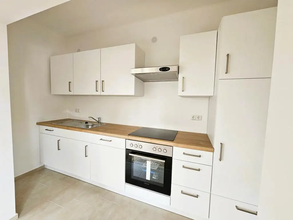Top sanierte 3-Zimmer-Wohnung mit neuer Küche und Garage!