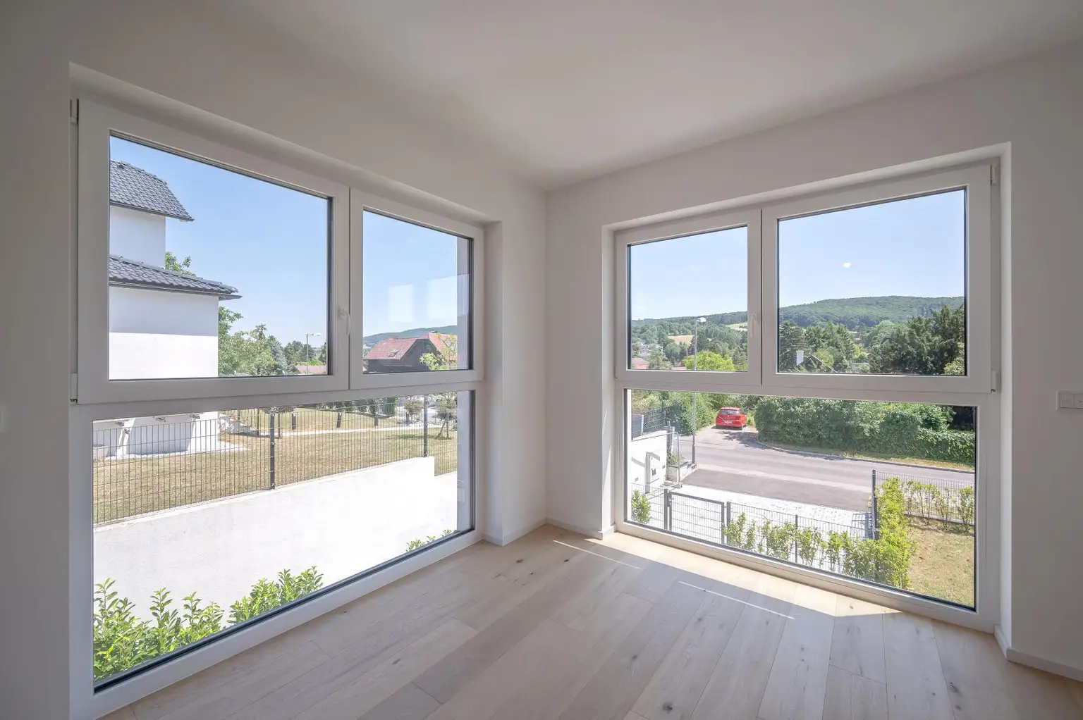 Erstbezug: Doppel-Haushälfte mit Fernblick und Wohlfühlambiente