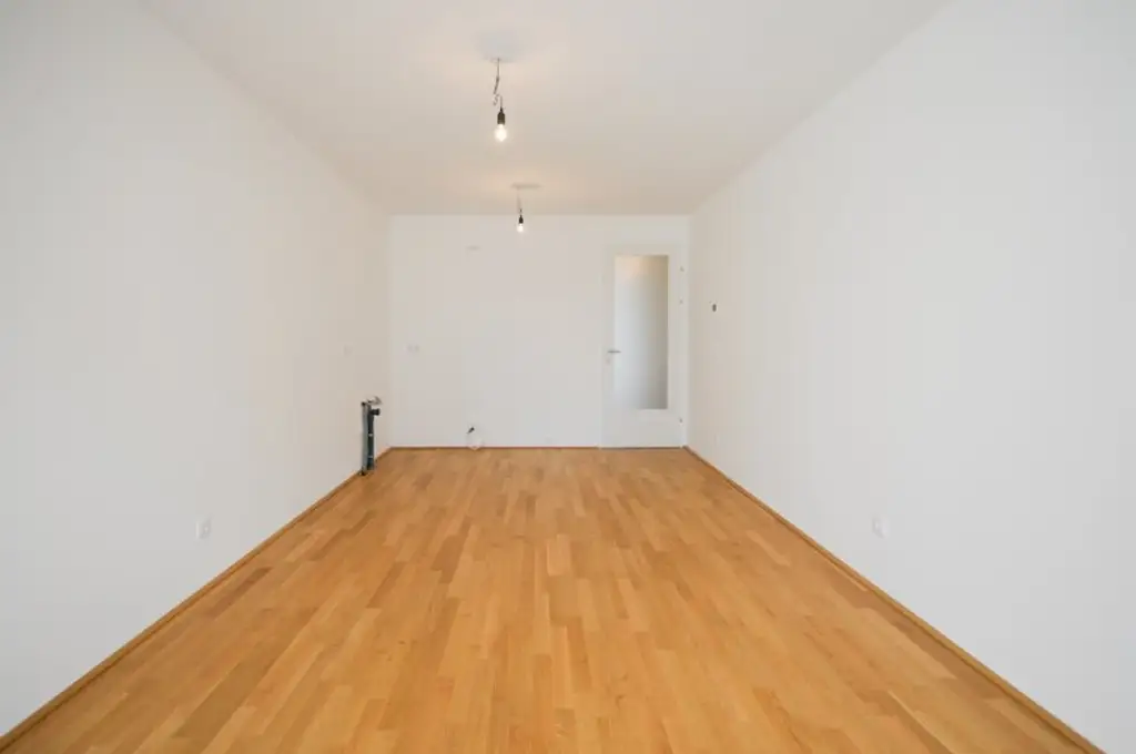 SCHÖNE 2-ZIMMER-WOHNUNG MIT SÜD-BALKON IM ERSTBEZUG