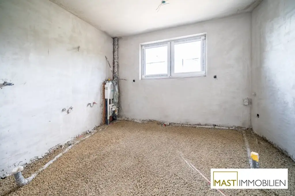 ERSTBEZUG - Modernes Einfamilienhaus mit 148 m² Wohnfläche, Balkon, Terrasse & 2 PKW-Stellplätzen in Strasshof – belagsfertig!