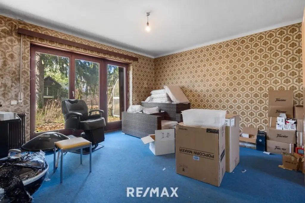 Renovierungsbedürftiges Einfamilienhaus mit Garten und Garage – Ihr neues Zuhause in Toplage