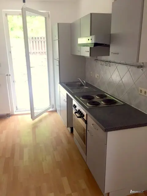 Küche mit Ausgang zur Terrasse