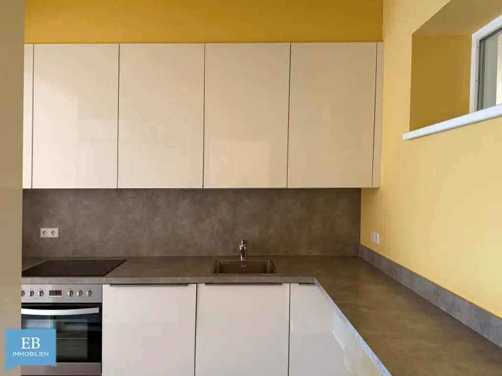 Helle Familienwohnung mit feiner Farbwelt und Fitnessraum im Haus