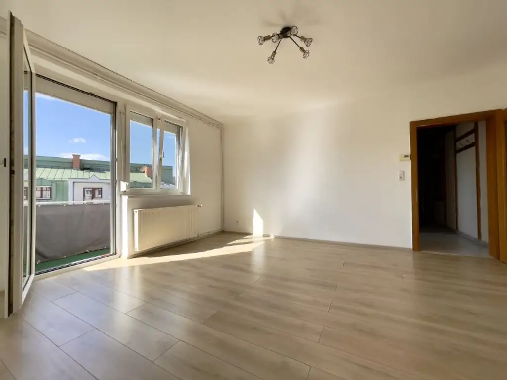 Hofseitige Wohlfühloase mit Balkon & Bergblick – ruhig gelegen, zentral erreichbar!
