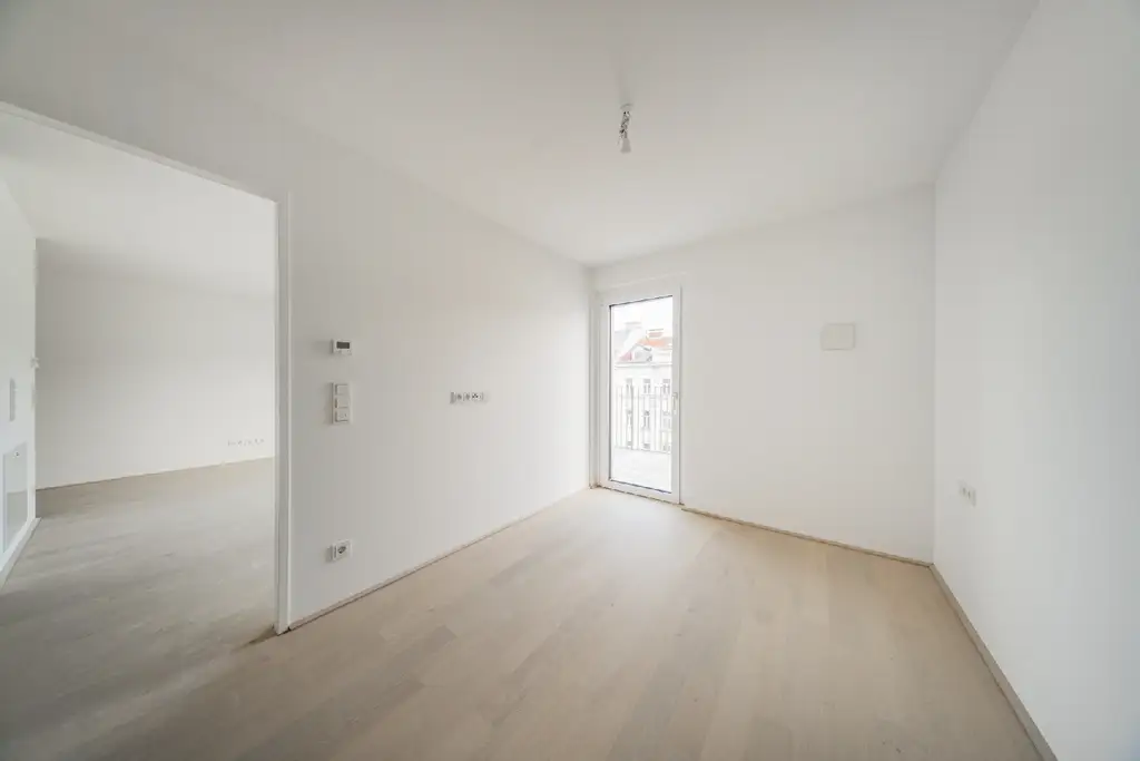 Moderne Stadtwohnung im 6. Stock mit Balkon – Erstbezug