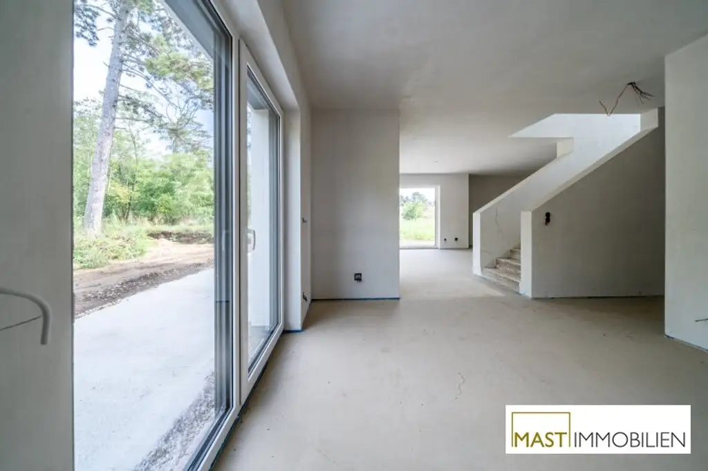ERSTBEZUG - Modernes Einfamilienhaus mit 148 m² Wohnfläche, Balkon, Terrasse & 2 PKW-Stellplätzen in Strasshof – belagsfertig!