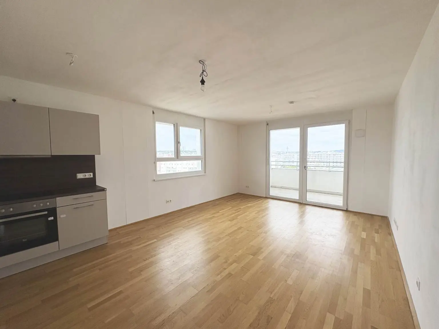 Q11 Leben in Simmering - 
3-Zimmer-Loggiawohnung mit Deckenkühlung - genießen Sie DIESEN Ausblick!