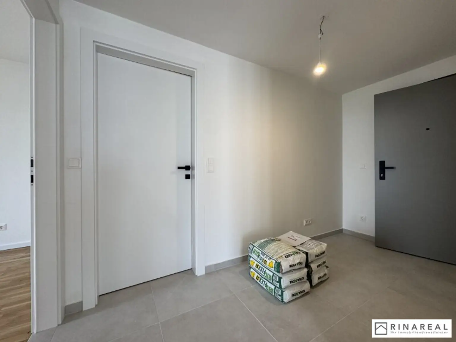 Traumhafte 3 Zimmer Gartenwohnung | Blumengasse - ERSTBEZUG | ca. 23 m² Terrasse & ung.150 m² Eigengarten | zzgl. Tiefgaragenstellplatz | Top D4