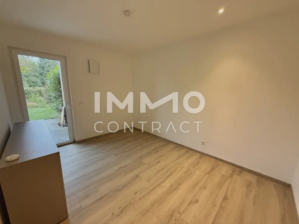 Ideale 2-Zimmer Gartenwohnung mit Tiefgarage und Parkplatz