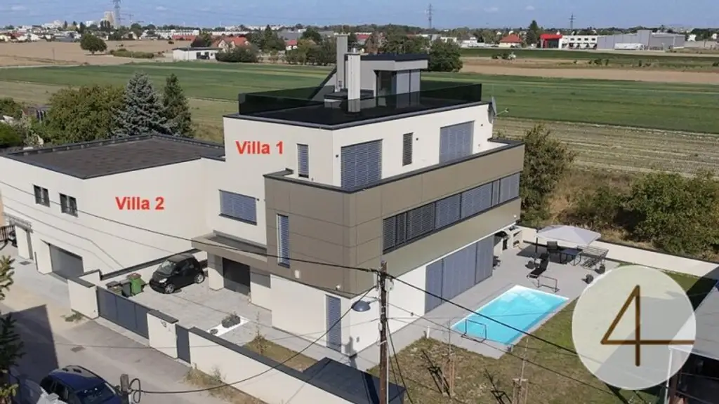 2 Premium-Villen direkt nebeneinander - mit grünem Weitblick - sonnige Ausrichtung - hochwertige Ausstattung - Salzwasserpool - Garage - Lift