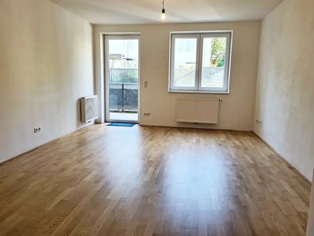 EIGENGARTEN, LORYSTRASSE, 75 m2 Neubau mit 23 m2 Garten, 2 Zimmer, Wohnküche, Wannenbad, Parketten, 1. Liftstock