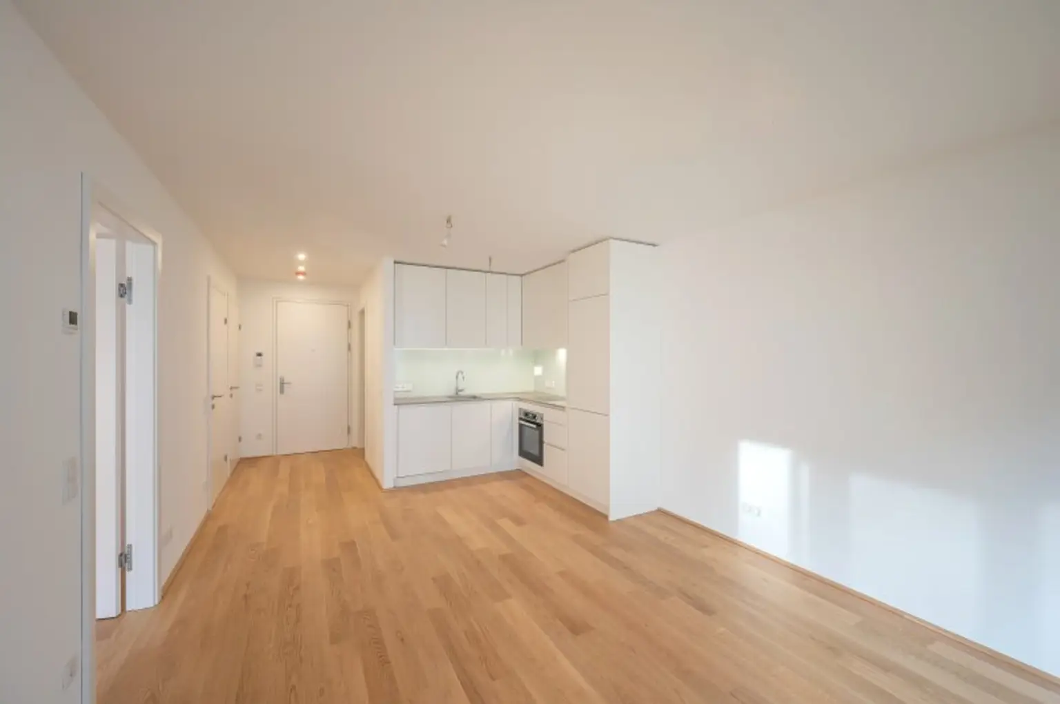 EDUART-Die Kunst des Wohnens: Hochwertiger 2-Zimmer NEUBAU-ZWEITBEZUG mit 15m² Garten und 10m² Terrasse! (8/7)