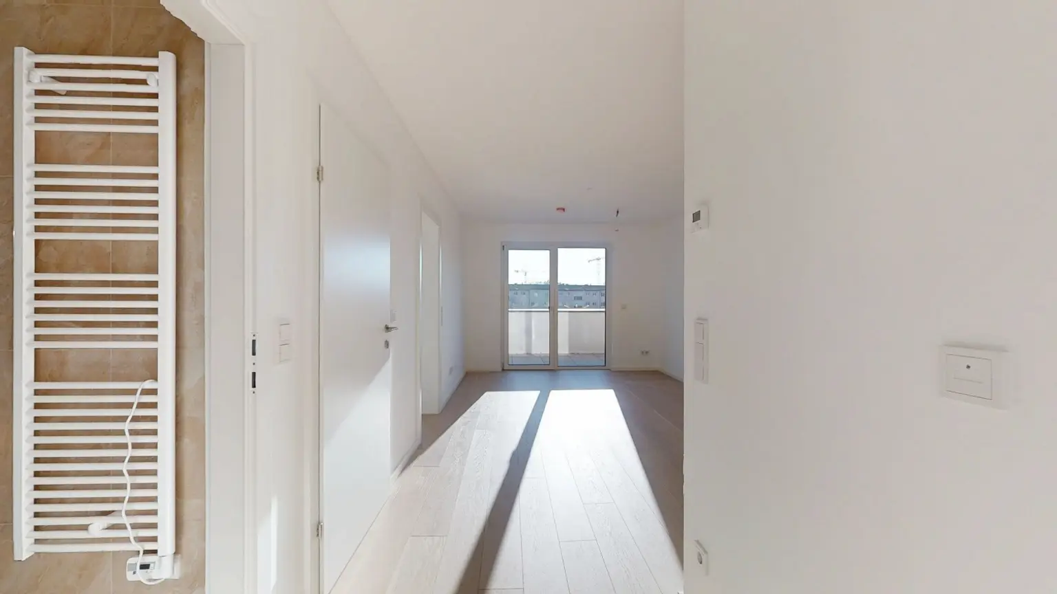 2-Zimmer-Erstbezug mit Innenhof-Balkon – Anleger oder Eigennutzer