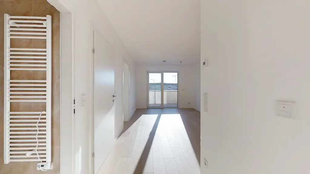 2-Zimmer-Erstbezug mit Innenhof-Balkon – Anleger oder Eigennutzer