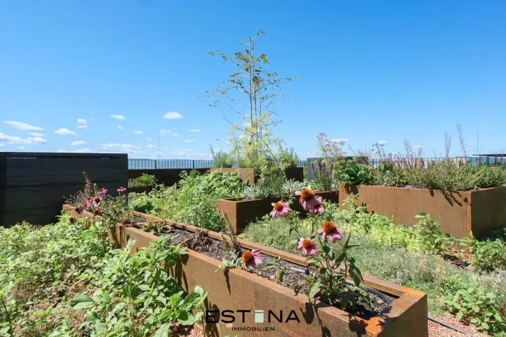 Exklusives Wohnen und Arbeiten in künstlerischer Gartengestaltung von André Heller