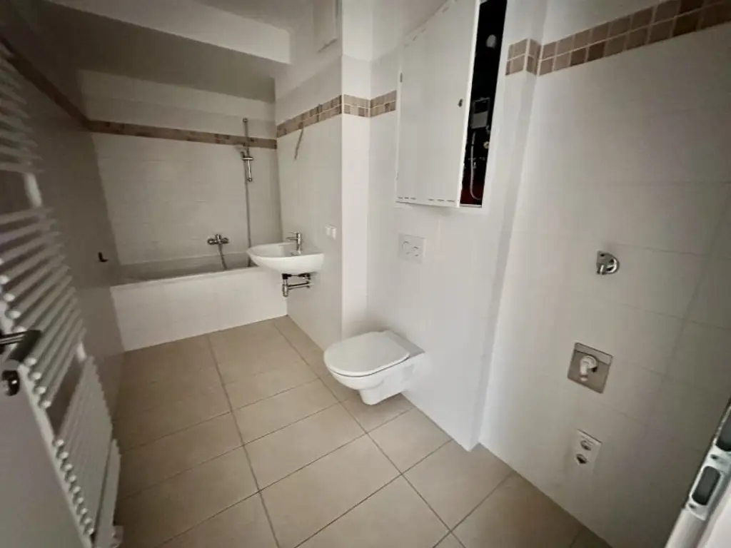 Anlegerwohnung in TOP-Neubau (BJ 2017) mit Tiefgaragenoption – BESTANDSFREI