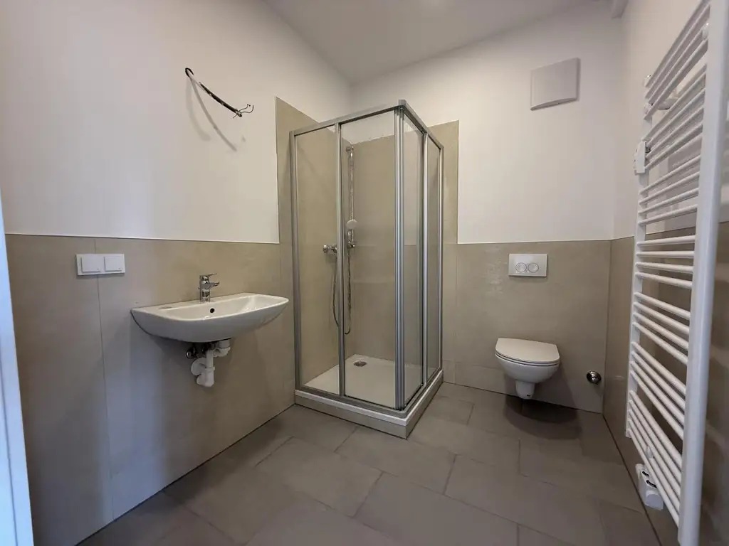 Erstbezug: Moderne Dachgeschosswohnung mit Balkon und Lift in begehrter Lage nahe dem Lendplatz K6/11