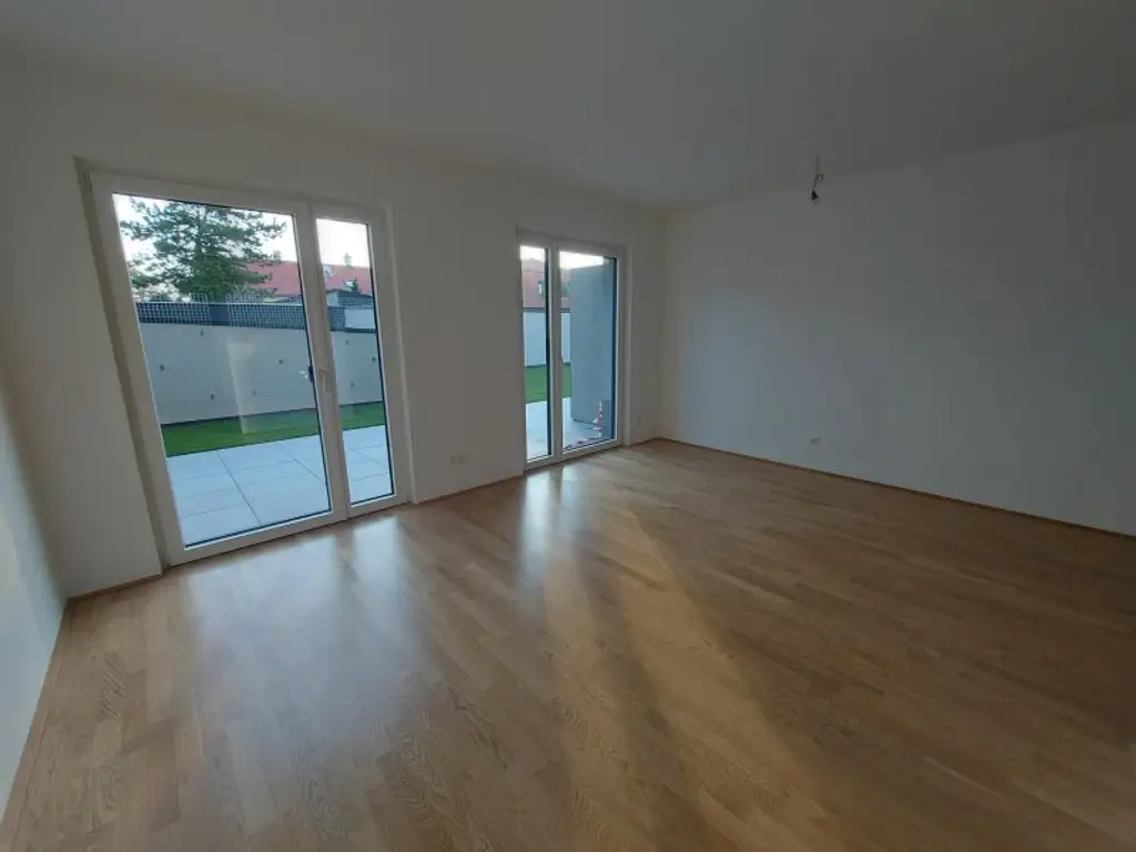 3-Zimmer-Erdgeschoßwohnung mit Terrasse und Tiefgaragenstellplatz (Top 02)