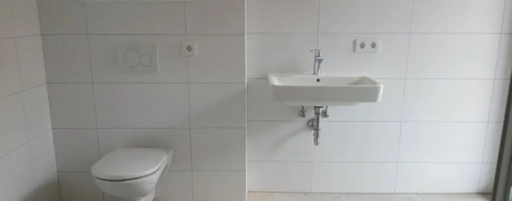 NEUBAU - ERSTBEZUG - Top 2 - Wunderschöne 2 Zimmerwohnung mit kleinem Garten, Terrasse und einem eigenen Tiefgaragenplatz