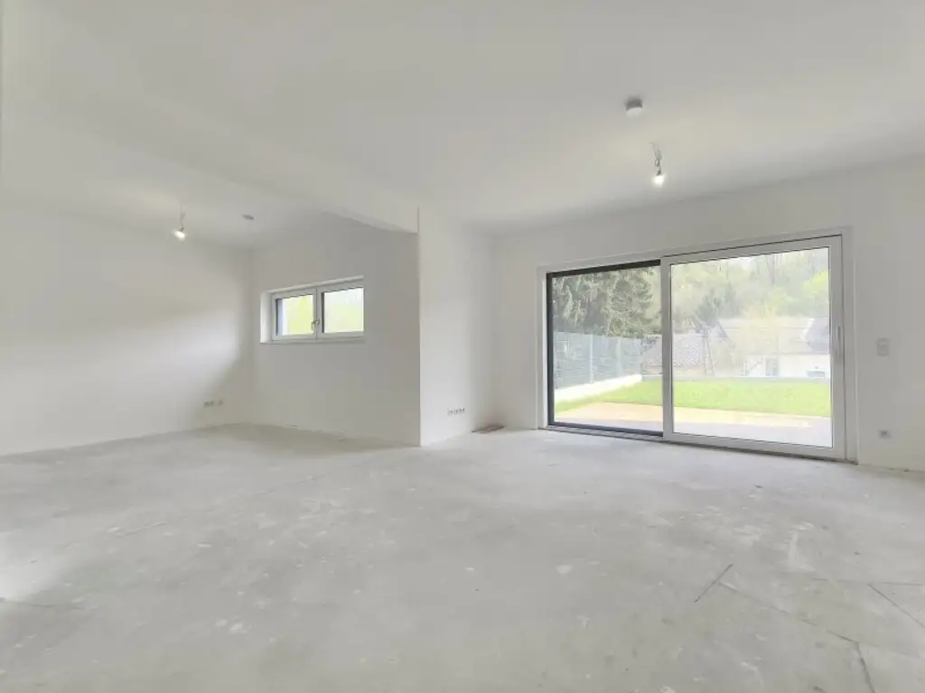 LEBENSQUALITÄT MIT AUSSICHT - EXKLUSIVES TOWNHAUS AUF EIGENGRUND IN WEIDLING – NATURNAHES WOHNEN MIT STIL
