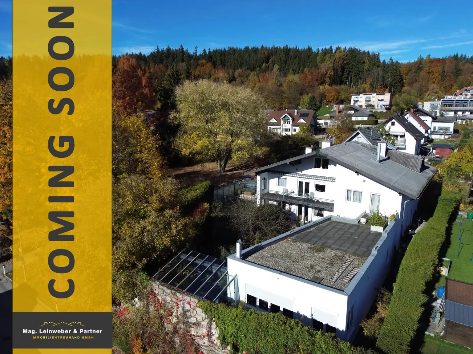 Leistbarer Wohntraum für 2 Familien mit XXL-Wintergarten, bombastischer Dachterrasse, großzügiger Gartenoase, Schwimmteich, Garage & Doppelcarport