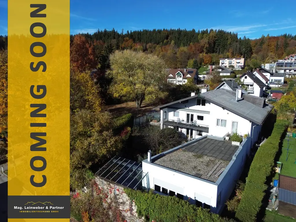 Leistbarer Wohntraum für 2 Familien mit XXL-Wintergarten, bombastischer Dachterrasse, großzügiger Gartenoase, Schwimmteich, Garage & Doppelcarport