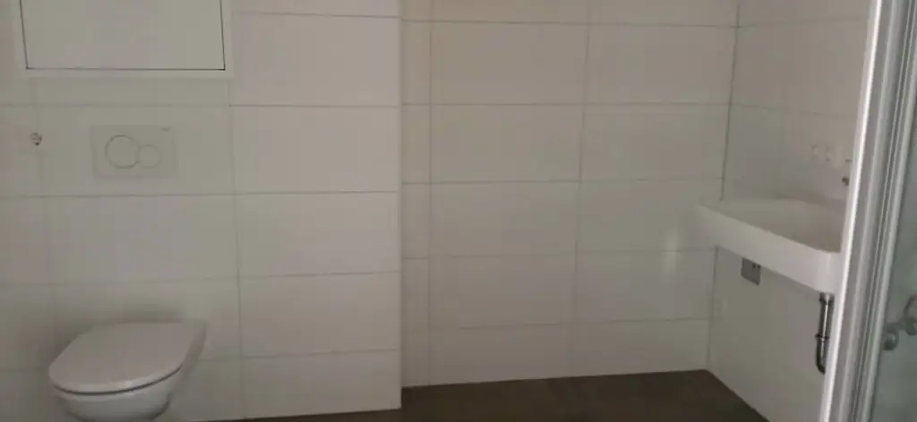 NEUBAU - ERSTBEZUG - Top 17 - Wunderschöne 2 Zimmerwohnung mit großem Balkon und eigenem Tiefgaragenplatz