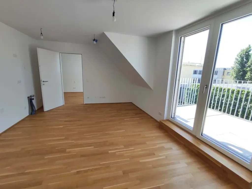 NEUBAU DACHGESCHOß-3-Zimmer-ERSTBEZUG mit Balkon in 1210 Wien! Top 2/50