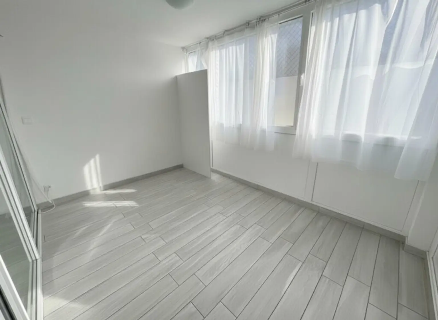 Helle 2-Zimmer-Wohnung mit großem Wintergarten (Heizkosten inkl.)