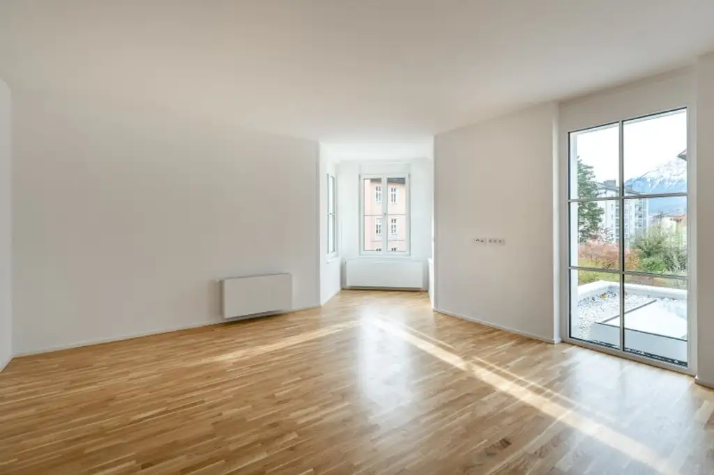 ELEGANZ TRIFFT MODERNE: Luxuriöse 3-Zimmer-Wohnung mit sonnigem Balkon inkl. Bergblick im Villenviertel zu mieten!