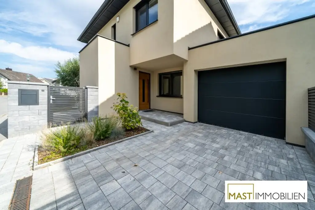 Modernes Einfamilienhaus mit Stil und Komfort in Schönkirchen-Reyersdorf.