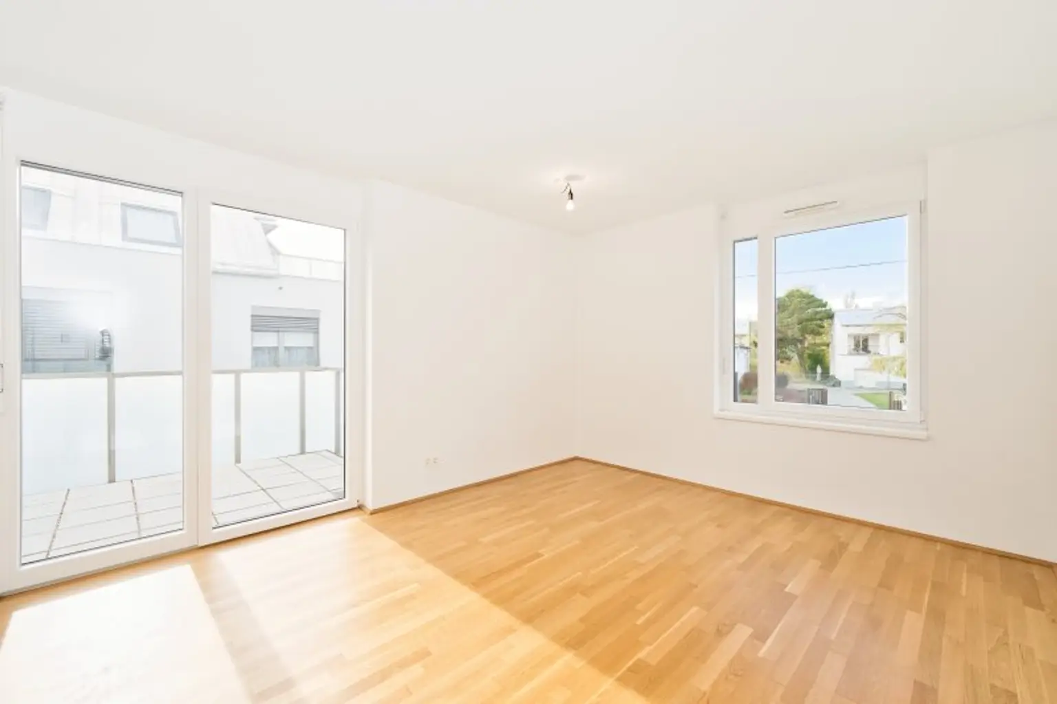 Sonnige 3-Zimmer-Eigentumswohnung mit Südterrasse & Garage – ruhig, grün & citynah an der renaturierten Liesing