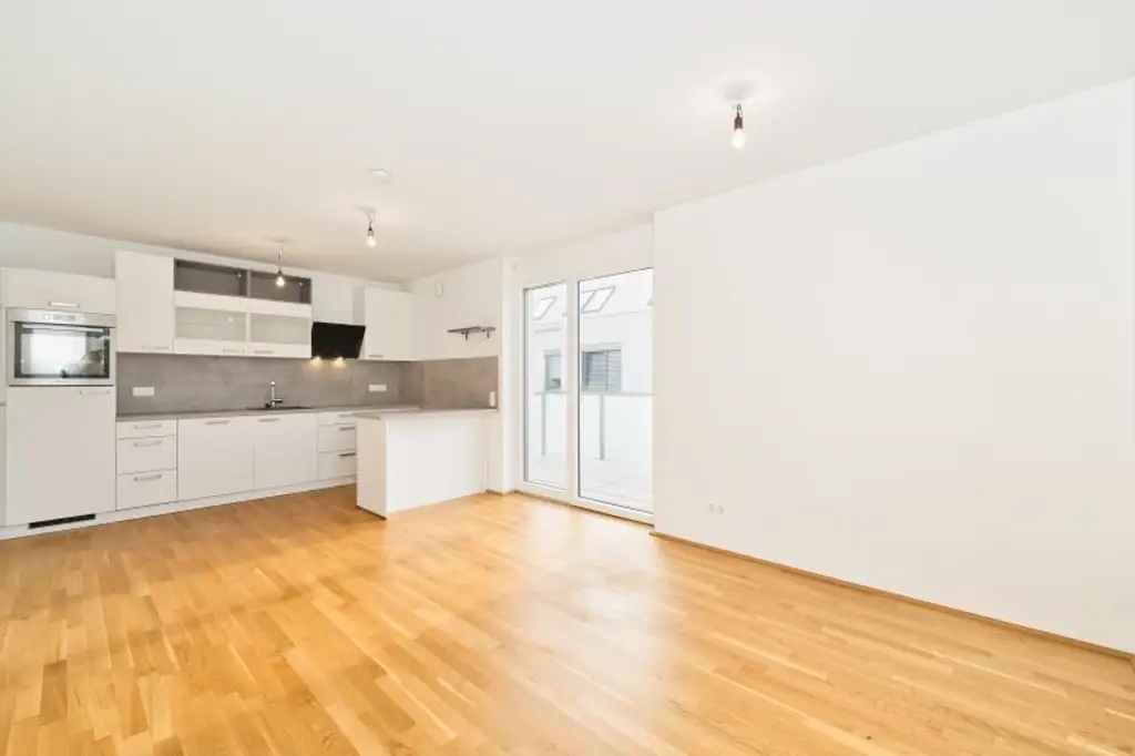 Sonnige 3-Zimmer-Eigentumswohnung mit Südterrasse & Garage – ruhig, grün & citynah an der renaturierten Liesing