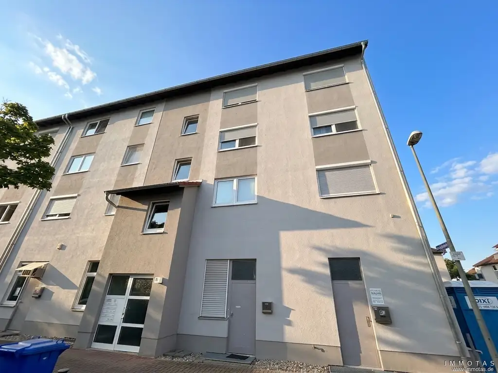 Vermietete 3-Zimmer-Eigentumswohnung mit Balkon und Tiefgaragenstellplatz in Edigheim