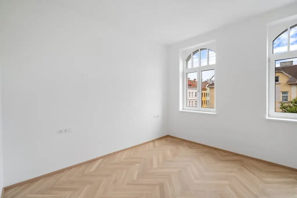 4-Zimmer-Altbaueigentumswohnung in generalsaniertem Altbau mit Balkon