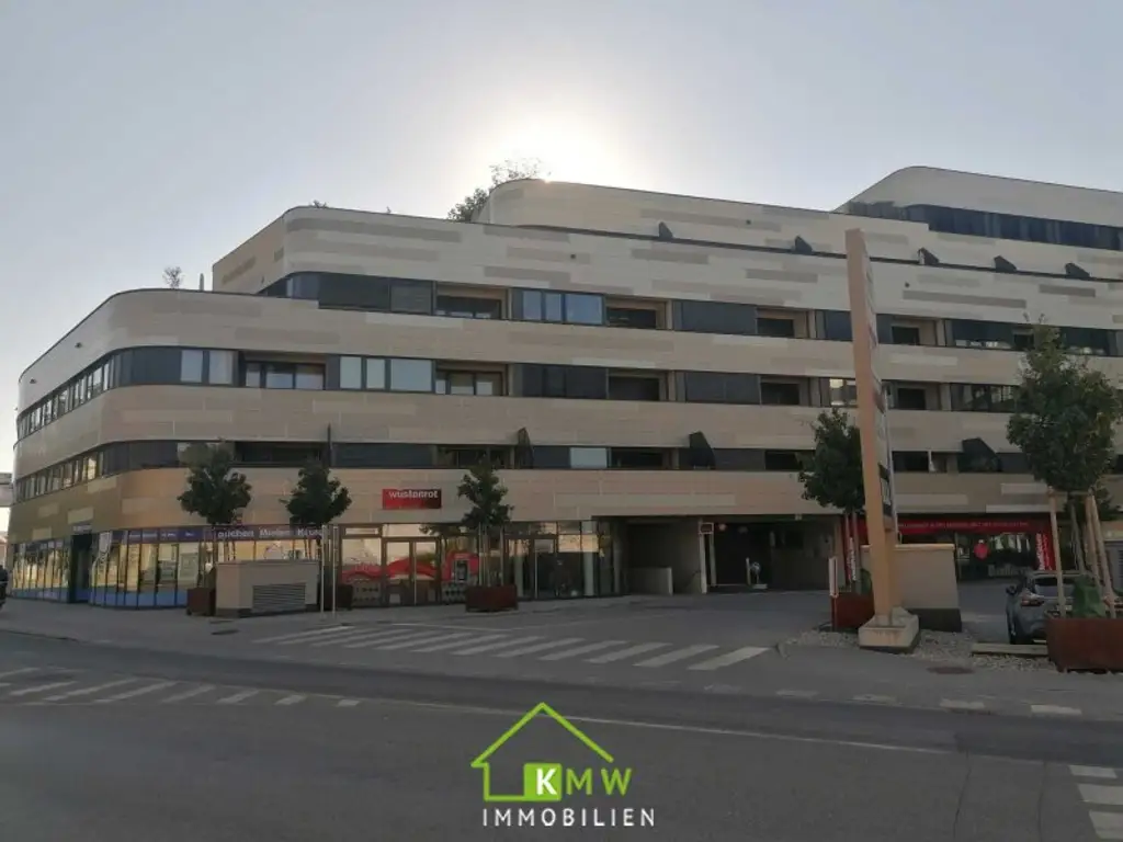 Lichtdurchflutete, moderne 2 Zimmer Wohnung mit Terrasse und 2 Tiefgaragenplätze