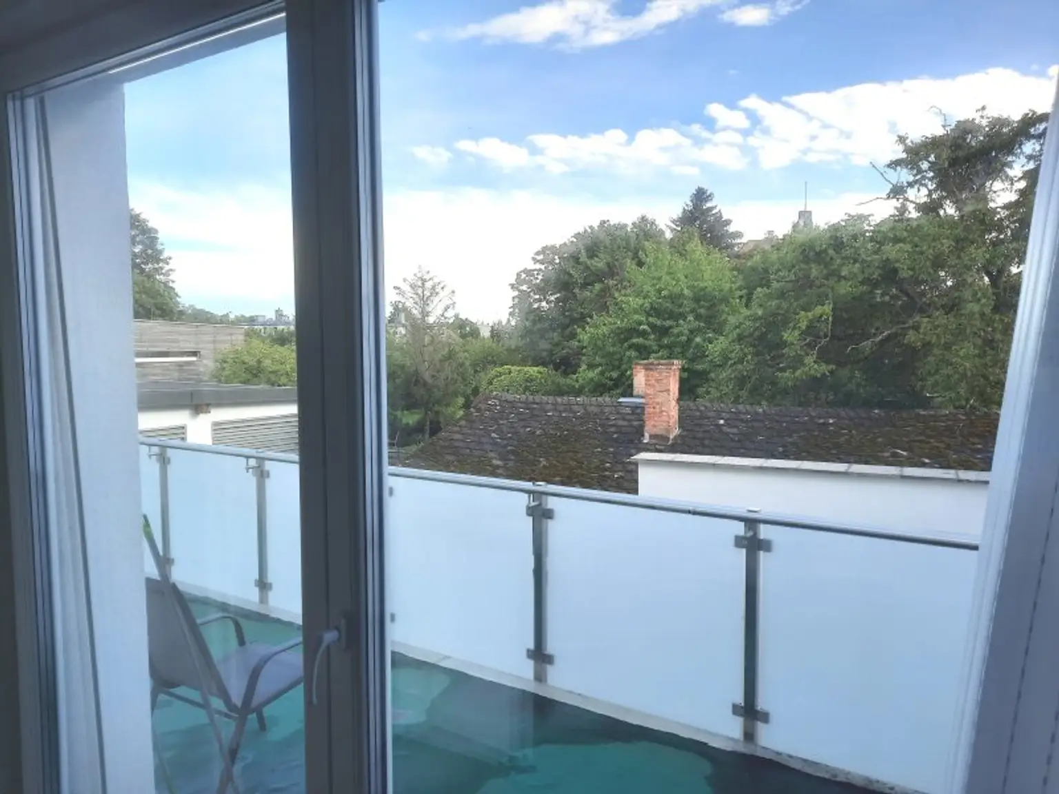 Anlegerpaket in Baden: 2 Wohnungen, 2 Stadthäuser und 4 Stellplätze