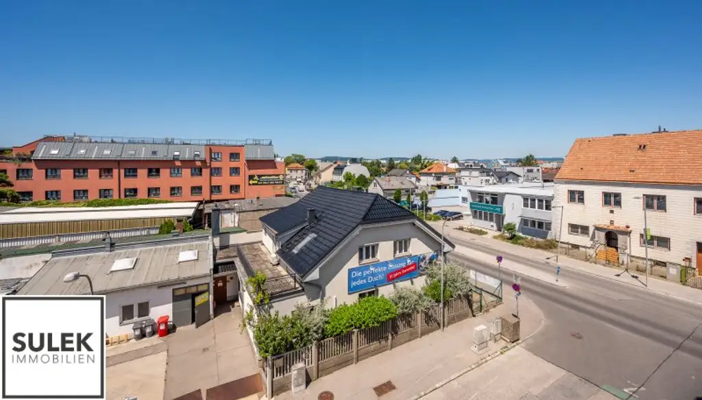 Grundstück mit vier Baukörpern - Büro-, Geschäfts- und Gewerbegebäude inkl. Parkplätzen in Vösendorf