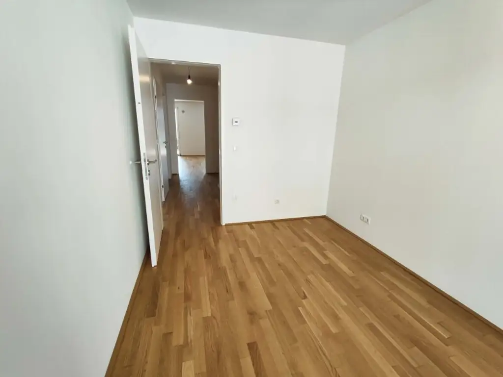 NEUBAU 3-Zimmer-ERSTBEZUG mit 2 Balkonen im 4. OG in 1210 Wien! Top 2/38