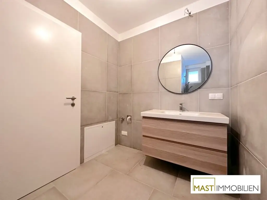 Ab sofort! Lichtdurchflutete 2-Zimmer-Neubauwohnung mit 8m² Terrasse