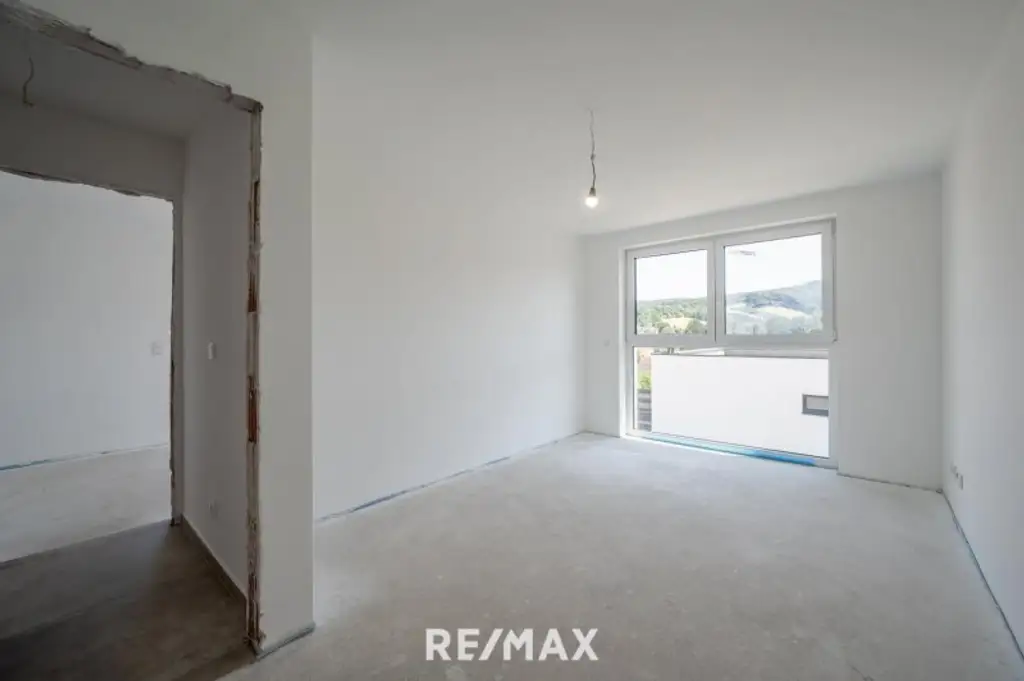 Erstbezug: Großzügiger Familientraum mit unverbaubarem Grünblick!