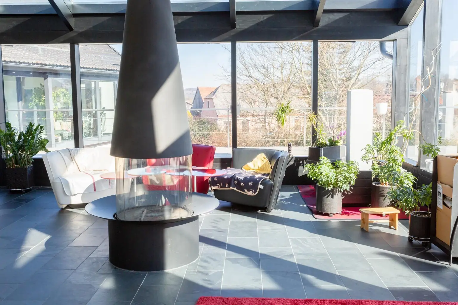 Wintergarten mit Feuerstelle