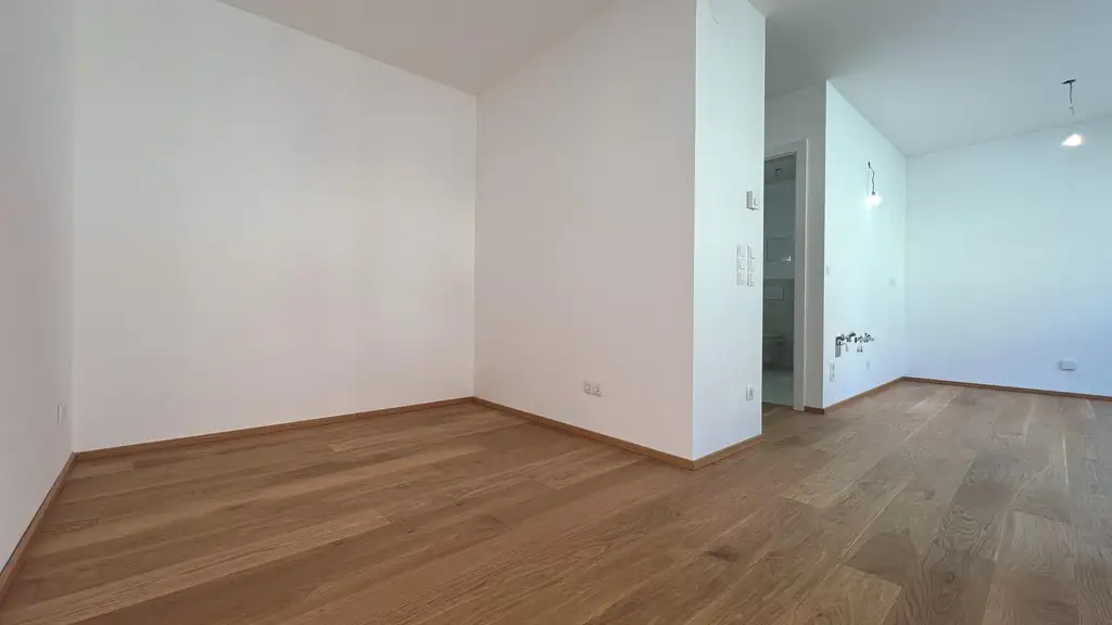 Erstbezug – kompakte 2-Zimmer-Wohnung mit Loggia, Luft-Wärmepumpe & PV-Anlage