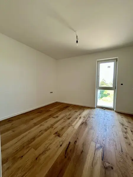 Erstbezug in Mannswörth: Moderne 2-Zimmer Wohnung mit Balkon