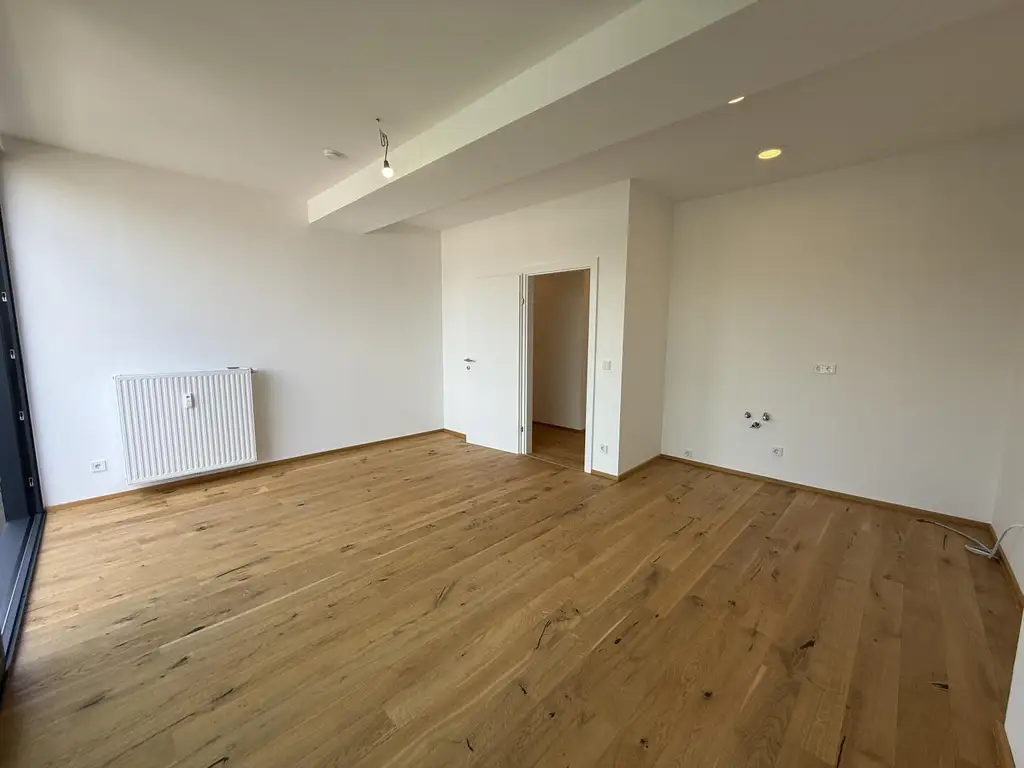 Erstbezug: Moderne Dachgeschosswohnung mit Balkon und Lift in begehrter Lage nahe dem Lendplatz K6/11