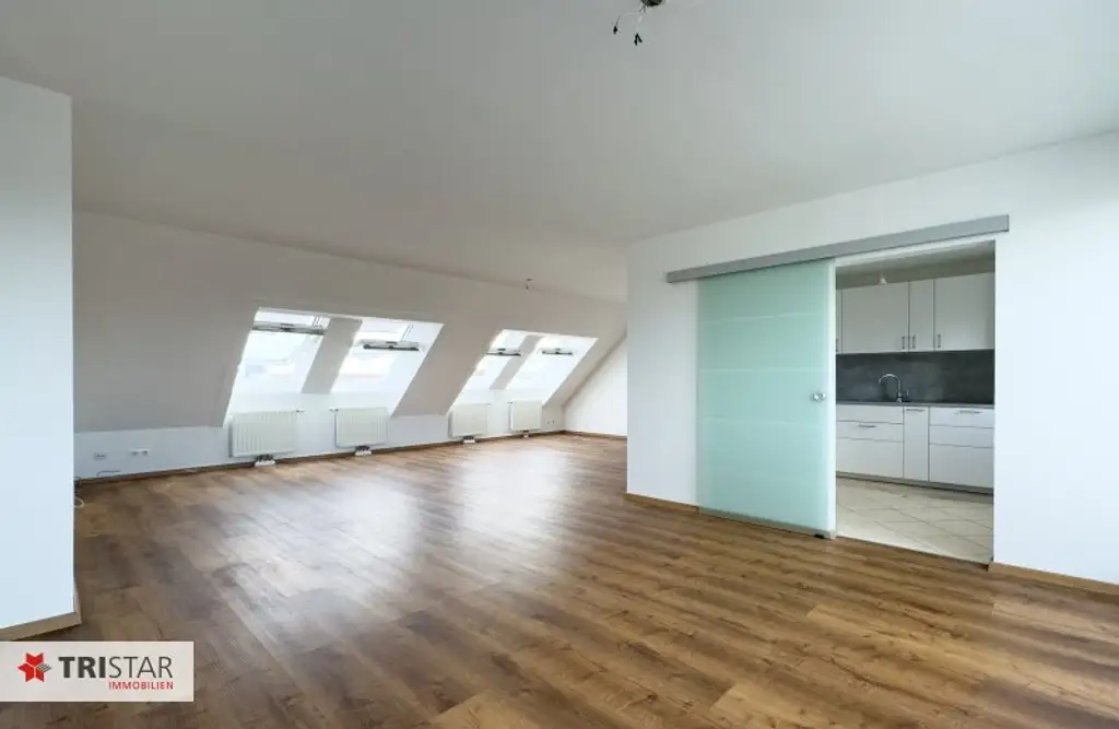 4-Zimmer-Dachtraum mit Südwest-Terrasse & Weitblick & Garage