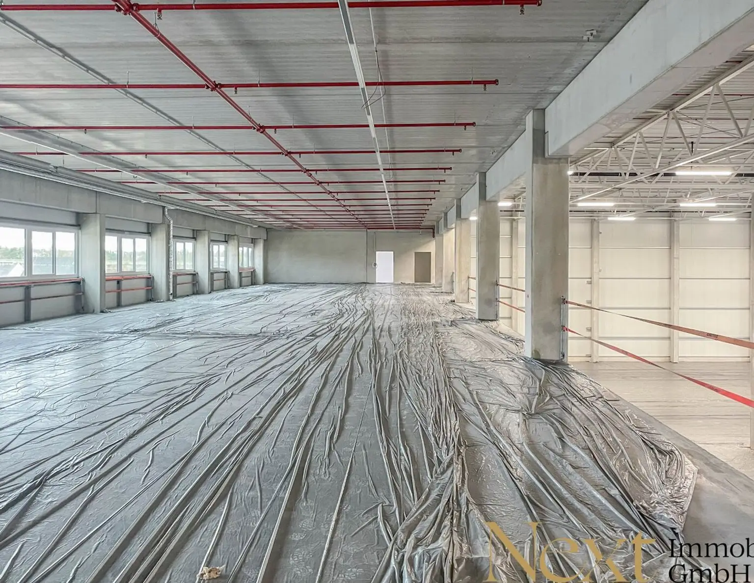 NEUBAU - Lager-/Produktionshalle (optional mit Büroflächen) in Enns/Ennshafen zu vermieten!