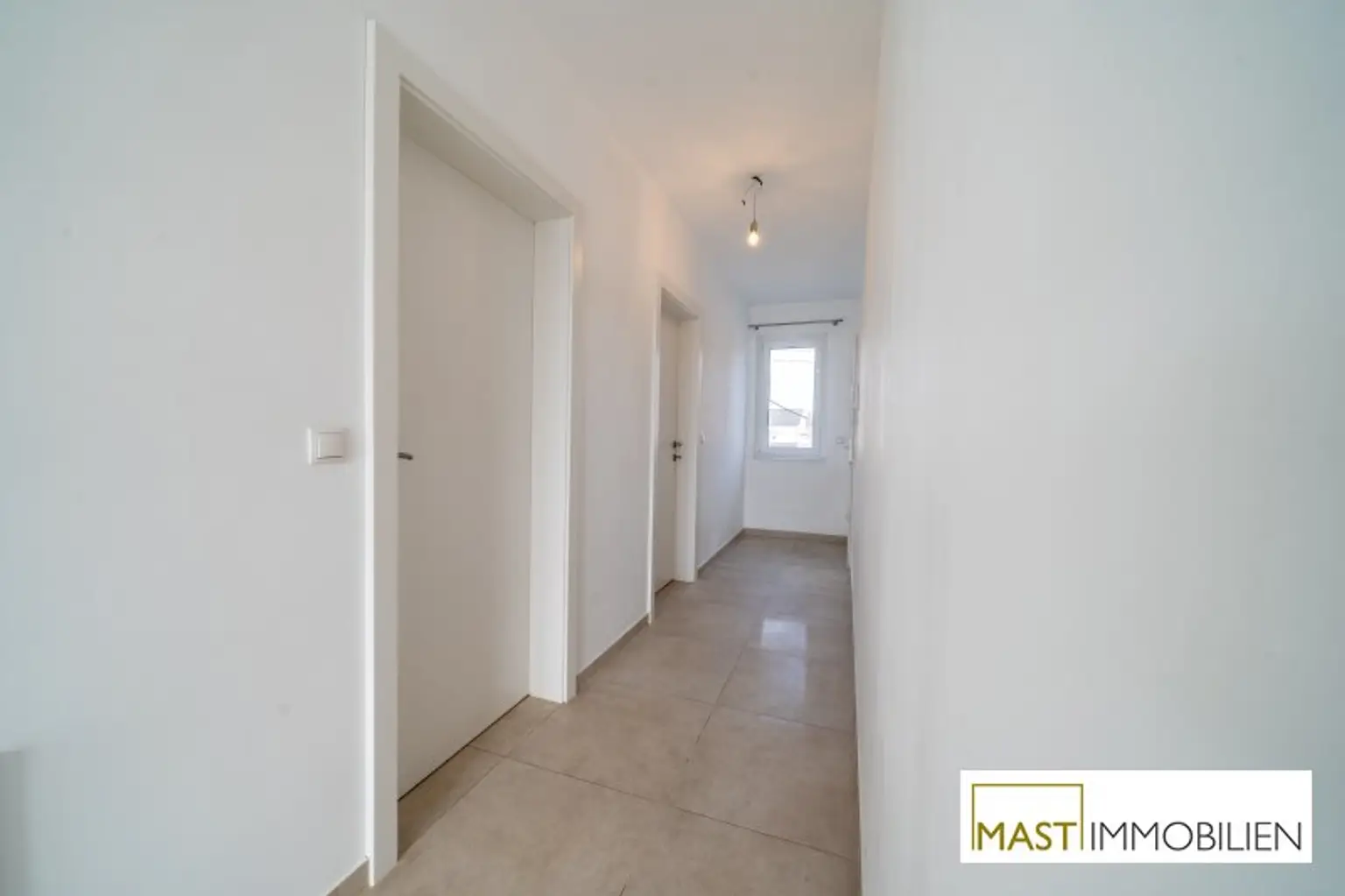 direkt im Herzen von Strasshof: moderne Wohnung mit Balkon und hochwertiger Ausstattung *sofort bezugsbereit