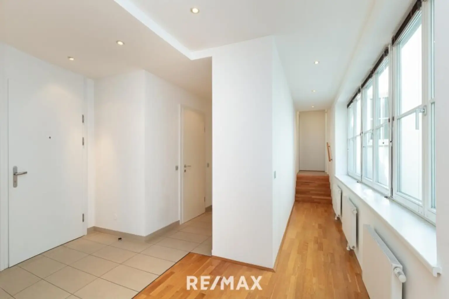 Altbau trifft Moderne – Wohnen über den Dächern